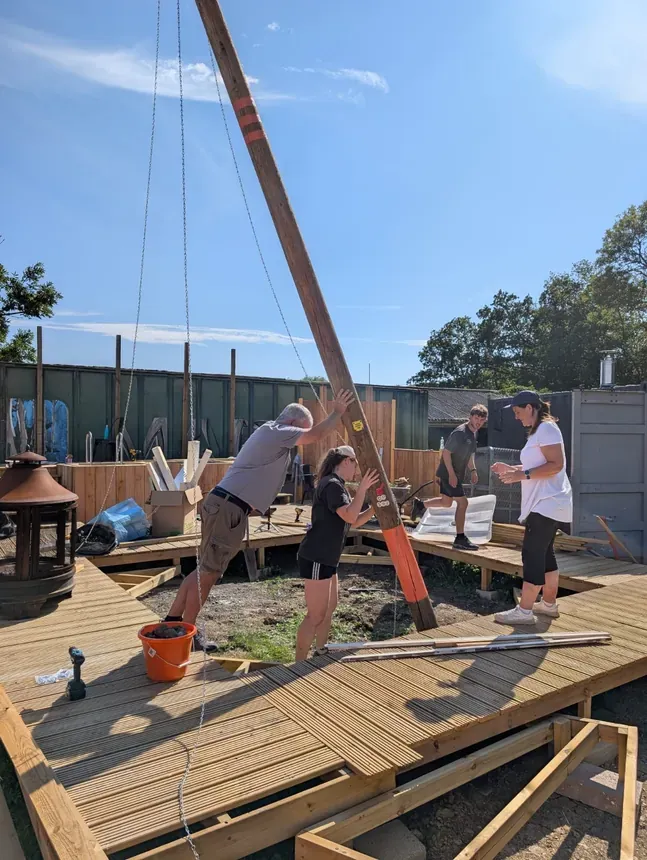 The Ward Family - Jason, Ethan & Cheryl getting the pole into position. Not quite Iwo Jima though!