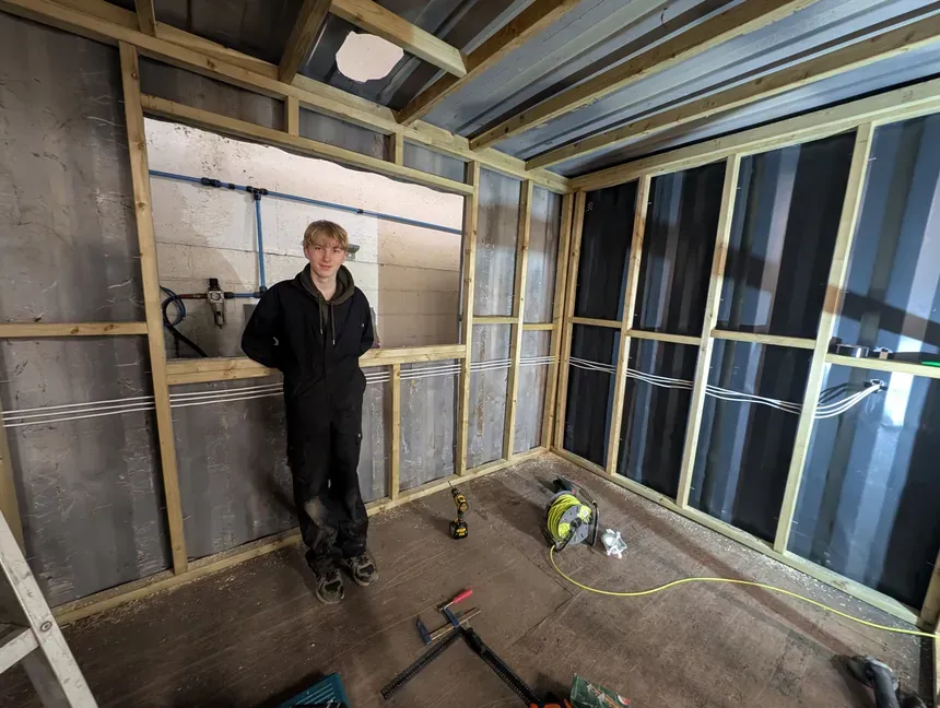 Spike - Showing off his framing & wiring… put us to shame!